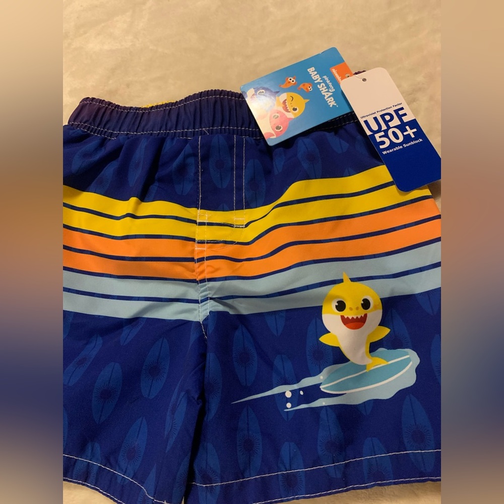 Size 24 months Baby shark swim trunk. Comfort mesh liner. UPF 50+ material